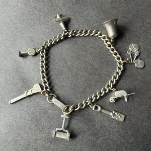 Vintage Silver Tone 8 Charm Bracelet  Mid Century Plane Bike Gardening Bell